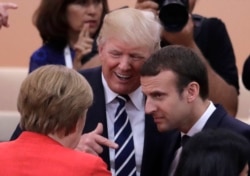 ABD Başkanı Donald Trump, Fransa Cumhurbaşkanı Emmanuel Macron ve Almanya Başbakanı Angela Merkel